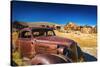 Rusted car and buildings, Bodie State Historic Park, California, USA-Russ Bishop-Stretched Canvas