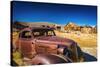 Rusted car and buildings, Bodie State Historic Park, California, USA-Russ Bishop-Stretched Canvas