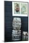 Rustic Barrels Lined Up Along an Old House Below a Window-Sheila Haddad-Mounted Photographic Print