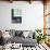 Rustic Barrels Lined Up Along an Old House Below a Window-Sheila Haddad-Photographic Print displayed on a wall