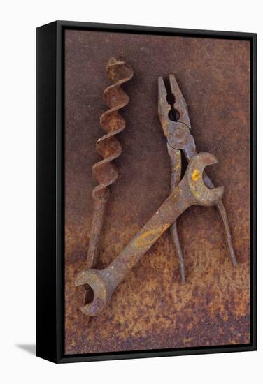 Rusty Old Double-headed Spanner Lying Next To Large Drill Bit And Rusty Pliers On Rusty Metal Sheet-Den Reader-Framed Stretched Canvas