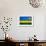 Rwanda Flag Design with Wood Patterning - Flags of the World Series-Philippe Hugonnard-Framed Art Print displayed on a wall