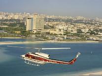 Helicopter over Abu Dhabi, U.A.E., Middle East-Ryan Peter-Photographic Print