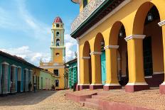 Cuban Flag Hanging on a Door in Trinidad, Cuba-Sabino Parente-Framed Stretched Canvas