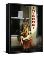 Sadhu Sitting Outside an Internet Cafe, Varanasi, Uttar Pradesh State, India-James Gritz-Framed Stretched Canvas