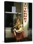 Sadhu Sitting Outside an Internet Cafe, Varanasi, Uttar Pradesh State, India-James Gritz-Stretched Canvas