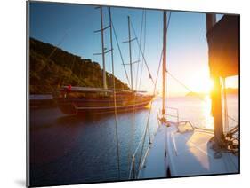 Sail Boats Anchored in a Calm Blue Water Bay of Skopea Limani. Turkey-Dudarev Mikhail-Mounted Photographic Print