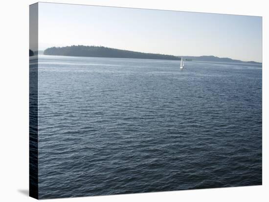 Sailboat on the Puget Sound Passes Blake Island, Washington State, United States of America-Aaron McCoy-Stretched Canvas