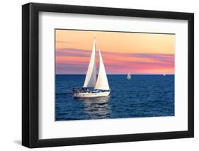 Sailboat Sailing towards Sunset on a Calm Evening-elenathewise-Framed Photographic Print