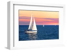 Sailboat Sailing towards Sunset on a Calm Evening-elenathewise-Framed Photographic Print