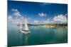 Sailing boat anchoring on Mana Island, Mamanuca Islands, Fiji, South Pacific-Michael Runkel-Mounted Photographic Print