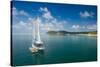 Sailing boat anchoring on Mana Island, Mamanuca Islands, Fiji, South Pacific-Michael Runkel-Stretched Canvas