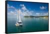 Sailing boat anchoring on Mana Island, Mamanuca Islands, Fiji, South Pacific-Michael Runkel-Framed Stretched Canvas