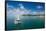 Sailing boat anchoring on Mana Island, Mamanuca Islands, Fiji, South Pacific-Michael Runkel-Framed Stretched Canvas