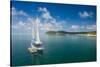 Sailing boat anchoring on Mana Island, Mamanuca Islands, Fiji, South Pacific-Michael Runkel-Stretched Canvas
