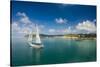 Sailing boat anchoring on Mana Island, Mamanuca Islands, Fiji, South Pacific-Michael Runkel-Stretched Canvas