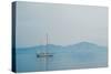 Sailing Boat on Lake-Clive Nolan-Stretched Canvas