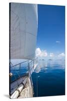 Sailing in the very flat waters of the Mamanuca Islands, Fiji, South Pacific-Michael Runkel-Stretched Canvas