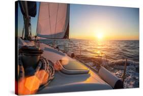 Sailing Ship Luxury Yacht Boat in the Sea during Amazing Sunset.-De Visu-Stretched Canvas