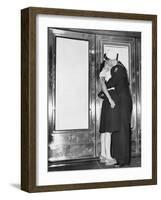 Sailor and His Girlfriend Celebrate News of the End of War in Front of a Theatre in New York's Time-null-Framed Photo