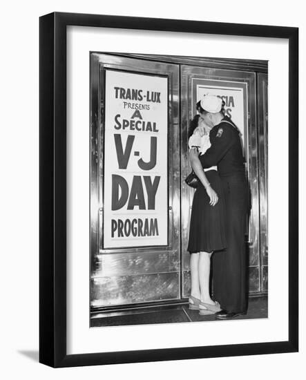 Sailor and His Girlfriend Celebrate News of the End of War in Front of a Theatre in New York's Time-null-Framed Photo