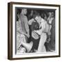 Sailor Kissing Pretty Girl amidst Jubilant Crowd in Celebration Regarding the End of WWII-Gordon Coster-Framed Photographic Print