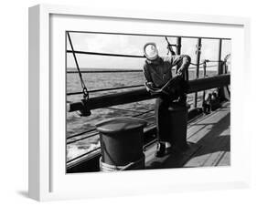 Sailor Relaxing Aboard a Us Navy Cruiser at Sea While Reading a Copy of Life Magazine During WWII-Ralph Morse-Framed Photographic Print