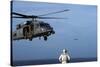 Sailor Watches an Air Force Hh-60G Pave Hawk Helicopter Prepare to Land-null-Stretched Canvas