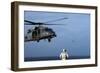 Sailor Watches an Air Force Hh-60G Pave Hawk Helicopter Prepare to Land-null-Framed Photographic Print