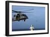 Sailor Watches an Air Force Hh-60G Pave Hawk Helicopter Prepare to Land-null-Framed Photographic Print