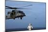 Sailor Watches an Air Force Hh-60G Pave Hawk Helicopter Prepare to Land-null-Mounted Photographic Print