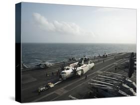 Sailors Move a C-2A Greyhound across the Flight Deck of USS Nimitz-null-Stretched Canvas