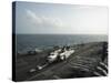 Sailors Move a C-2A Greyhound across the Flight Deck of USS Nimitz-null-Stretched Canvas