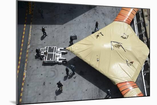 Sailors Move an X-47B Unmanned Combat Air System-null-Mounted Photographic Print
