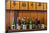 Sake Bottles in a Sake Brewery, Takayama, Gifu Prefecture, Japan-Stefano Politi Markovina-Mounted Photographic Print