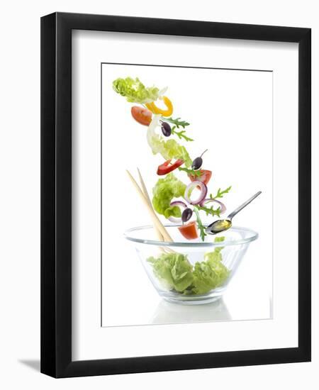 Salad Ingredients Falling into a Glass Bowl-Caroline Martin-Framed Premium Photographic Print