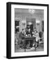 Salesman from Cartier Jewelers Helping a Couple Pick Out a Ring-null-Framed Photographic Print