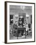 Salesman from Cartier Jewelers Helping a Couple Pick Out a Ring-null-Framed Photographic Print