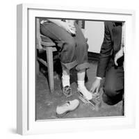 Salesmen Helps Woman with Safety Work Shoes, Ca. 1943-null-Framed Photographic Print