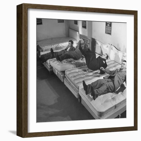 Salesmen Showing How Not to Test a Bed-null-Framed Photographic Print