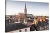 Salisbury cathedral across the rooftops of the city, Salisbury, Wiltshire, England, United Kingdom,-Julian Elliott-Stretched Canvas