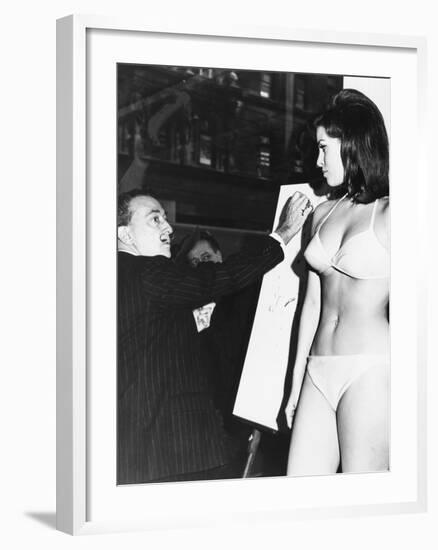 Salvador Dali Sketching Raquel Welch in Publicity Shot for Fantastic Voyage-null-Framed Photo