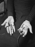 Pair of Hands Wearing Lie Detector Device-Sam Shere-Photographic Print
