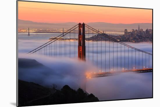 San Francisco At Sunrise, Behind The Golden Gate Bridge And A Low Blanket Of Fog-Joe Azure-Mounted Photographic Print