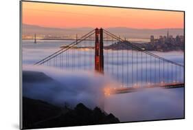 San Francisco At Sunrise, Behind The Golden Gate Bridge And A Low Blanket Of Fog-Joe Azure-Mounted Photographic Print