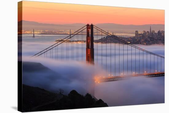 San Francisco At Sunrise, Behind The Golden Gate Bridge And A Low Blanket Of Fog-Joe Azure-Stretched Canvas