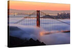 San Francisco At Sunrise, Behind The Golden Gate Bridge And A Low Blanket Of Fog-Joe Azure-Stretched Canvas