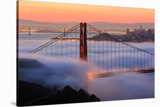 San Francisco At Sunrise, Behind The Golden Gate Bridge And A Low Blanket Of Fog-Joe Azure-Stretched Canvas