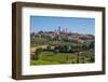 San Gimignano, Siena Province, Tuscany, Italy. Fields surrounding the medieval town famous for i...-null-Framed Photographic Print