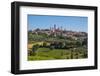 San Gimignano, Siena Province, Tuscany, Italy. Fields surrounding the medieval town famous for i...-null-Framed Photographic Print